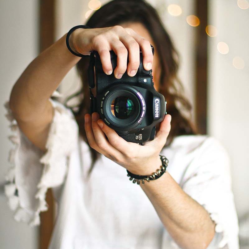 portrait of the photographer holding camera