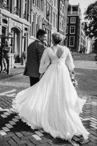 walk of the bride and groom in Amsterdam at a wedding photoshoot in Amsterdam