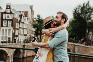 Happy couple after the guy proposed to his girlfriend in Amsterdam. He chose Amsterdam proposal package to capture this special moment