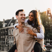 Couple embracing during an engagement photoshoot in Amsterdam captured by an Amsterdam photographer
